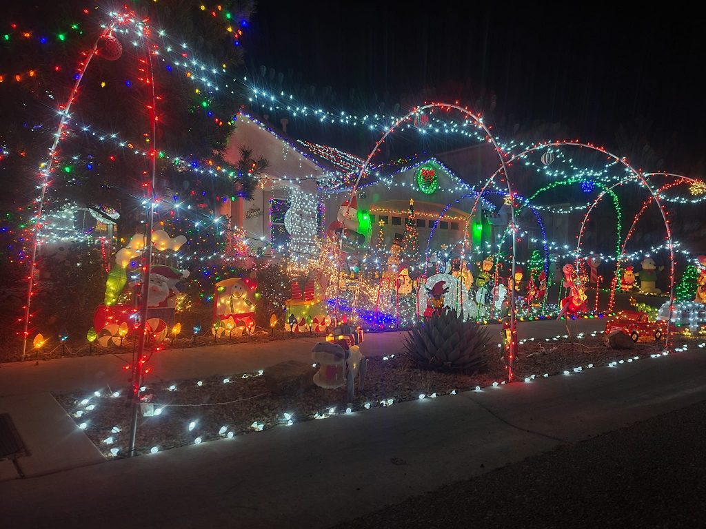The Trujillos' home lit up at night.